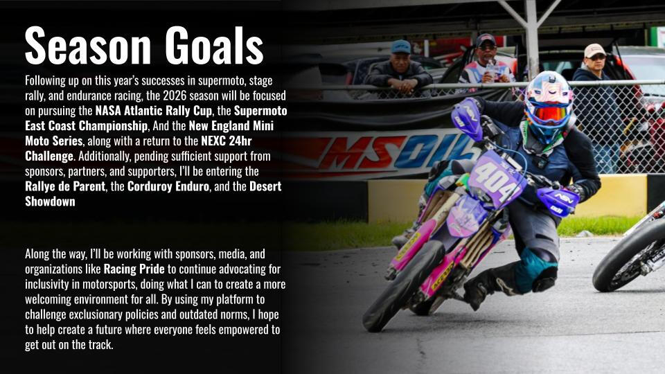 Tali rides her blue motorcycle towards the camera on a racetrack